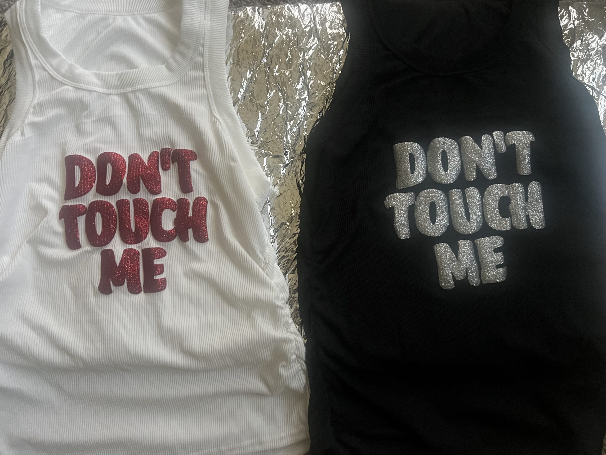 Don't Touch Me tank tops